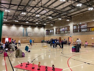 A photo of Whitton sports centre as the team for the National Boccia Day tournament play Boccia
