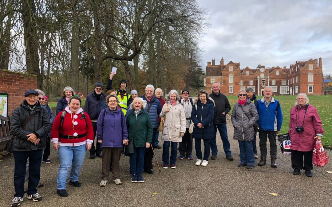 The ActivLives Health Walking group stand in front on Christchurch Mansion in Ipswich. All smile at the camera just before tehy head off on their Christmas 2021 walk.