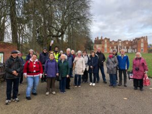 The ActivLives Health Walking group stand in front on Christchurch Mansion in Ipswich. All smile at the camera just before tehy head off on their Christmas 2021 walk.
