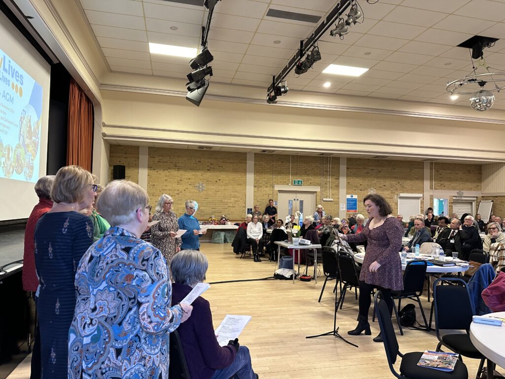 Members of the ActivSinging serenading an audience during an event