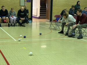 player throwing a ball of boccia in the festival